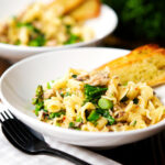 Tinned mackerel, tenderstem broccoli and lemon pasta served with garlic bread.