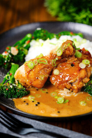 Chicken adobo with coconut milk (Adobong Manok sa Gata) served with stir fried broccoli and rice.