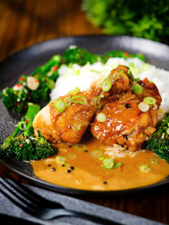 Chicken adobo with coconut milk (Adobong Manok sa Gata) served with stir fried broccoli and rice.
