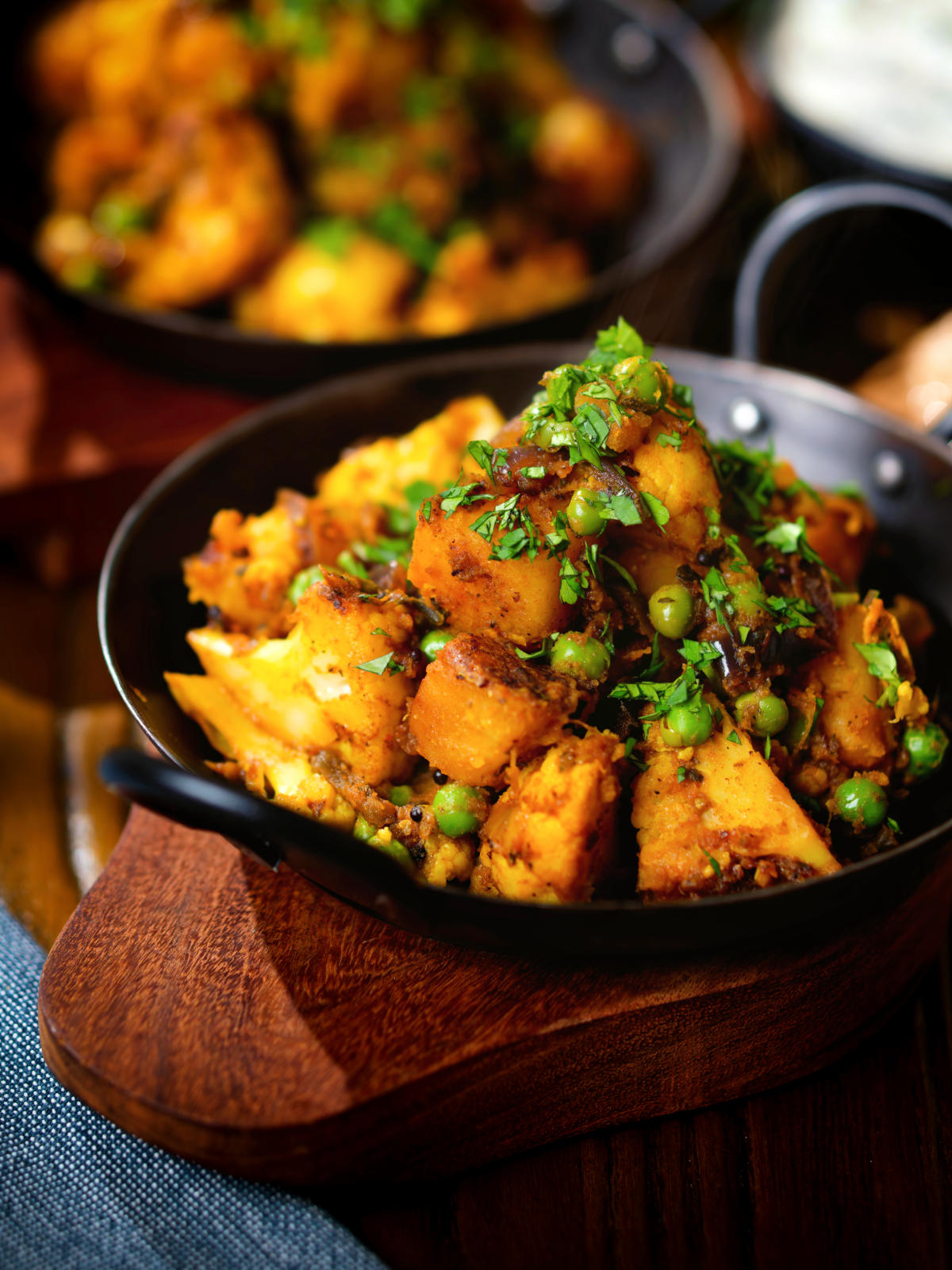Indian aloo gobi matar ki sabzi: Dry vegan potato, cauliflower and pea curry.