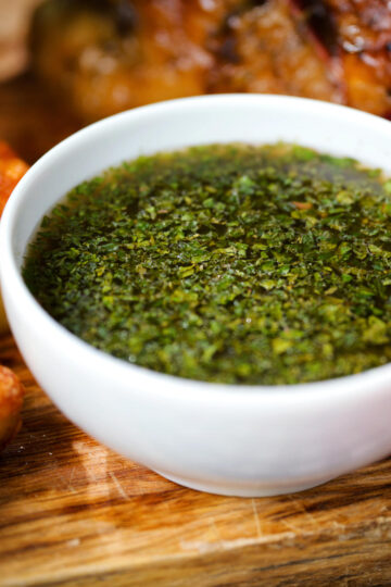 Homemade mint sauce in a white bowl.