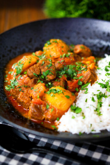 South African influenced lamb and potato Durban curry served with rice.