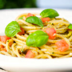 Close-up Sicilian pesto alla trapanese served with spaghetti.