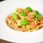 Sicilian pesto alla trapanese served with spaghetti.