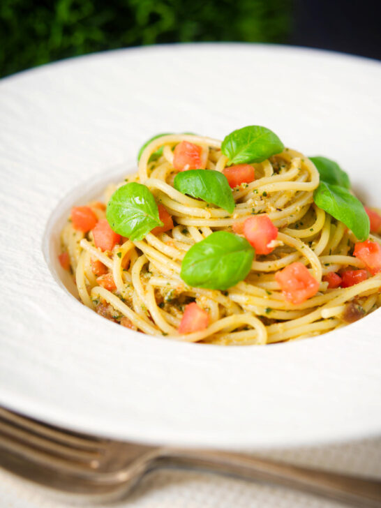 Sicilian pesto alla trapanese served with spaghetti.