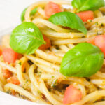 Close-up Sicilian pesto alla trapanese served with spaghetti.