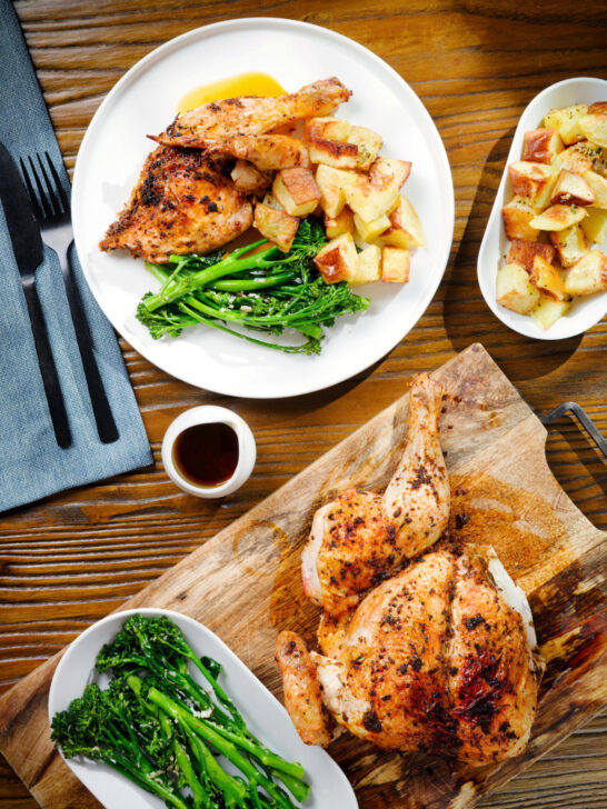 Overhead spatchcock chicken alla diavola with Parmentier potatoes and tenderstem broccoli.