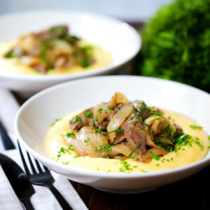 Fegato alla Veneziana (Venetian fried calves liver and onions) served with polenta.