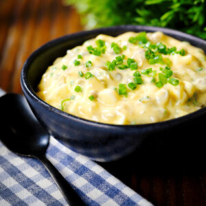 French sauce gribiche (made with boiled eggs) garnished with snipped chives.