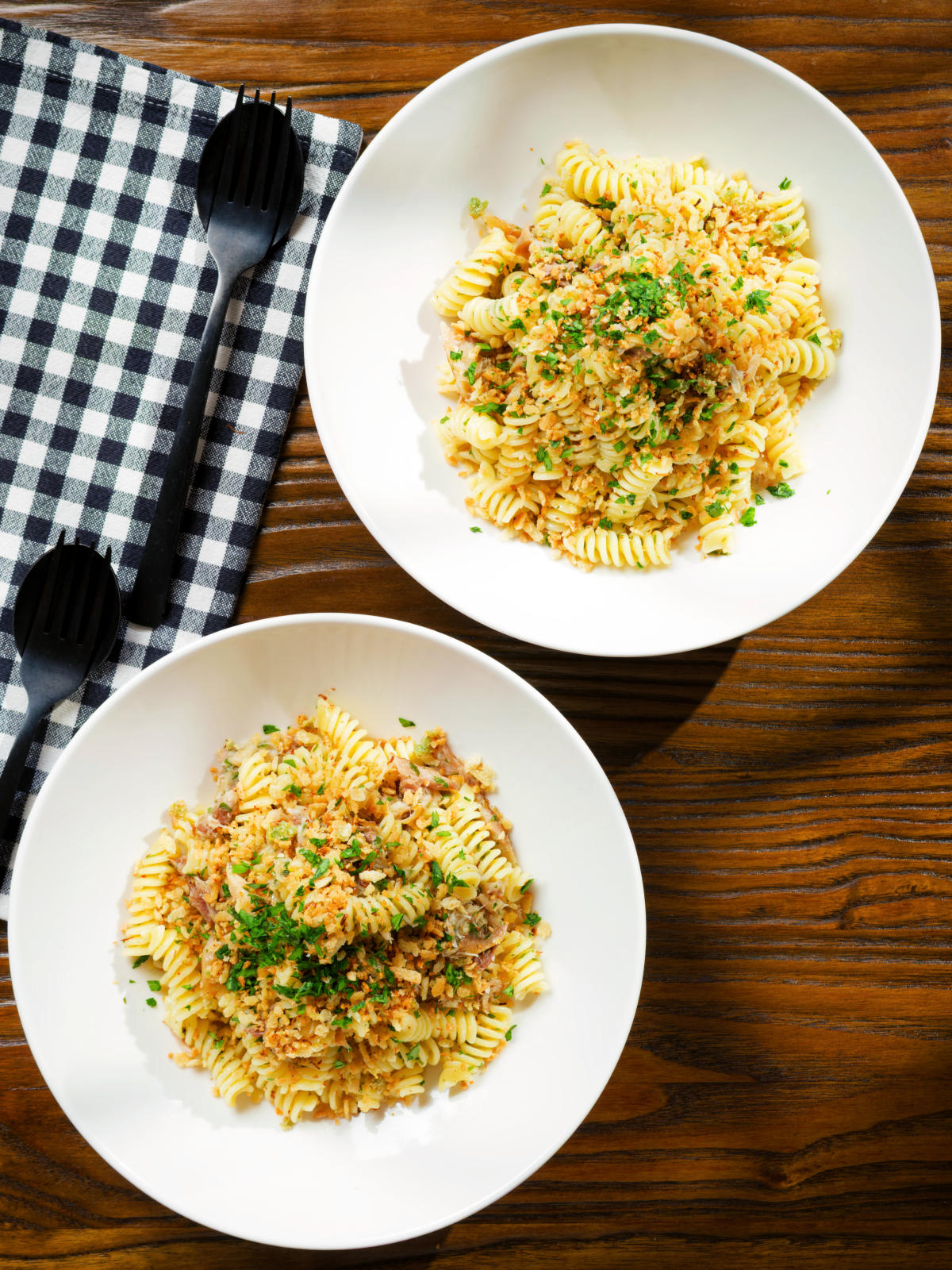 Overhead smoked mackerel pasta (fusilli) with chilli and a lemon crumb.