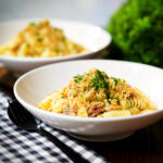 Smoked mackerel pasta (fusilli) with chilli and a lemon crumb garnished with fresh parsley.