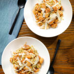 Overhead pan fried cabbage and walnut gnocchi with balsamic vinegar.