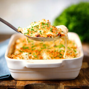 Crispy cheese and lightly caramelised onion gnocchi gratin.