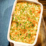 Overhead cheese and onion baked gnocchi gratin.