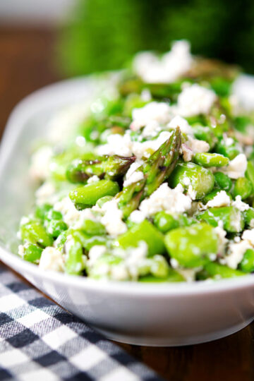 Minted pea and feta salad with asparagus and broad beans.