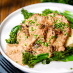 Pork tenderloin with prunes and brandy cream sauce, mashed potato and tenderstem broccoli.