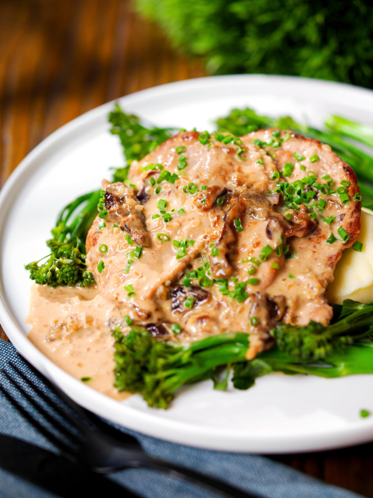 Pork tenderloin with prunes and brandy cream sauce, mashed potato and tenderstem broccoli.