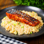 Hoisin sauce glazed (grilled) salmon fillet served with egg fried rice.