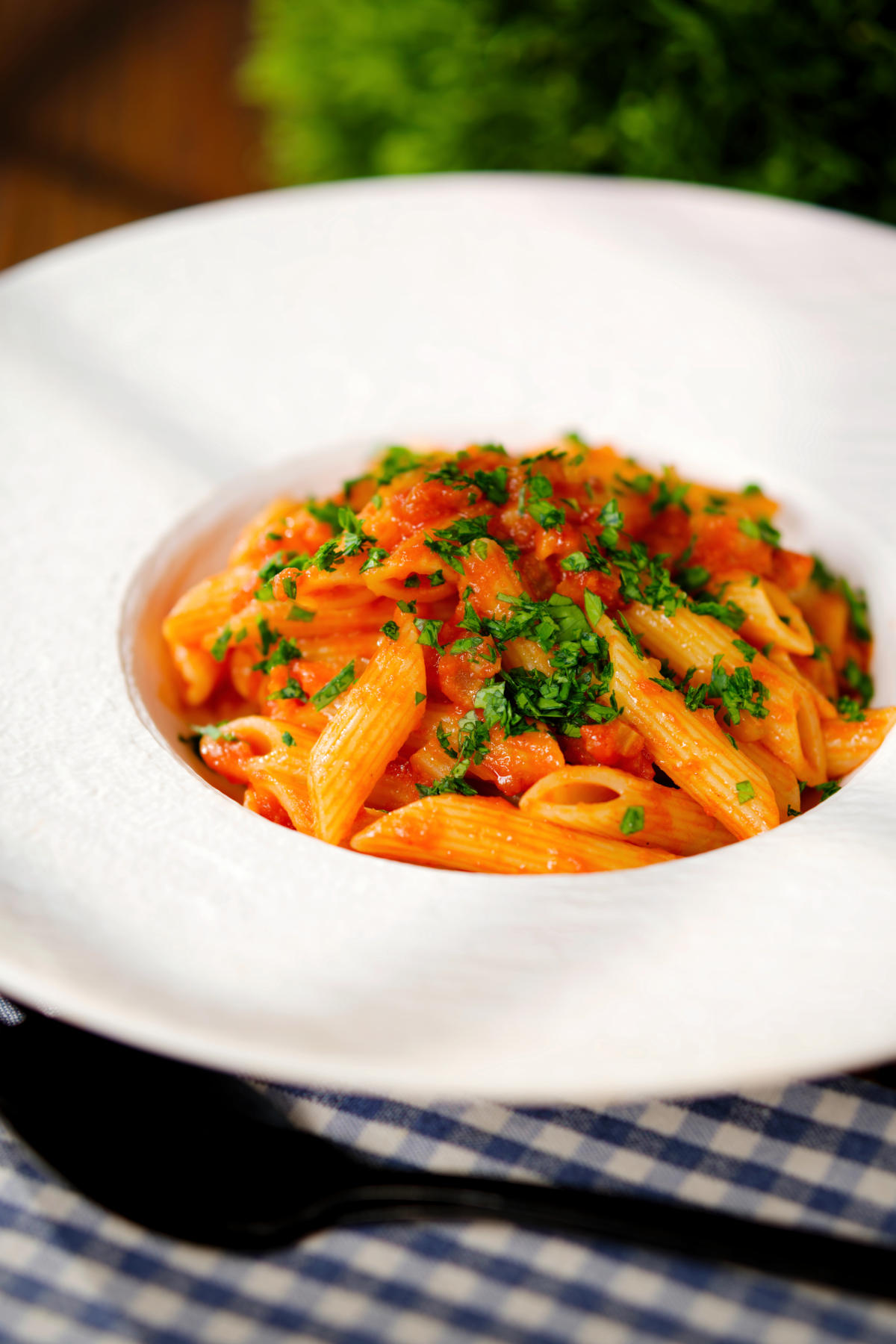 Bloody Mary Pasta (penne alla vodka), served in a white bowl.