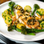 Pan fried halibut with Grenobloise sauce, buttered potatoes and tenderstem broccoli.