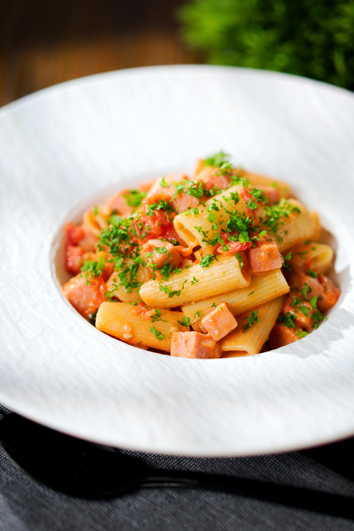 Spam pasta in a tomato and Dijon mustard sauce.